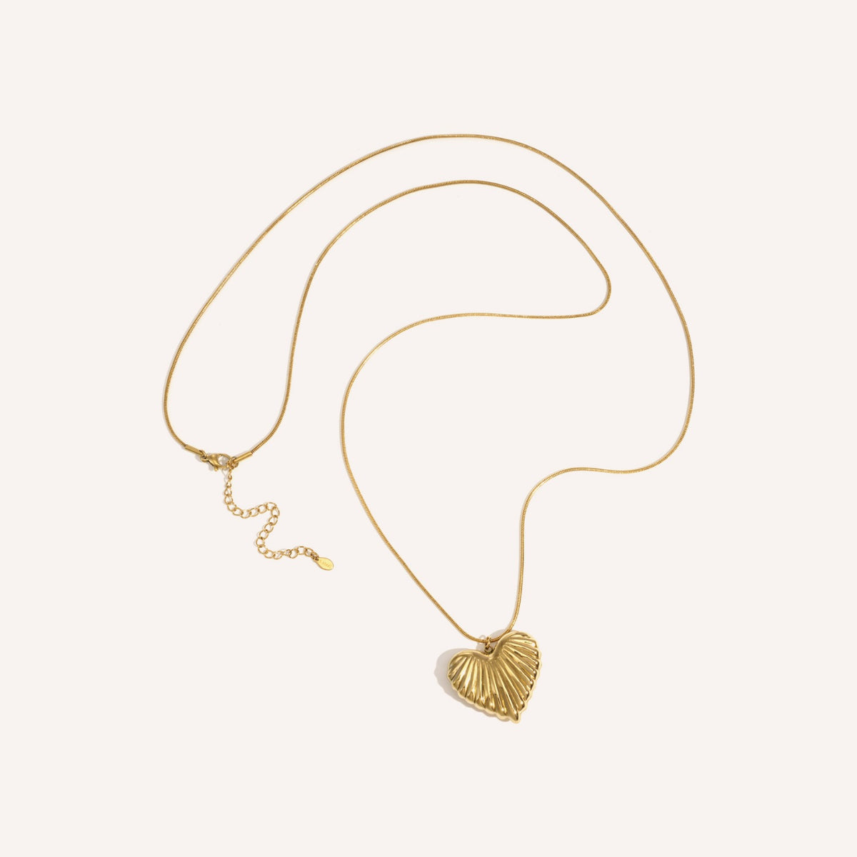 Alghero Ketting, lange goudkleurige ketting met hartjeshanger