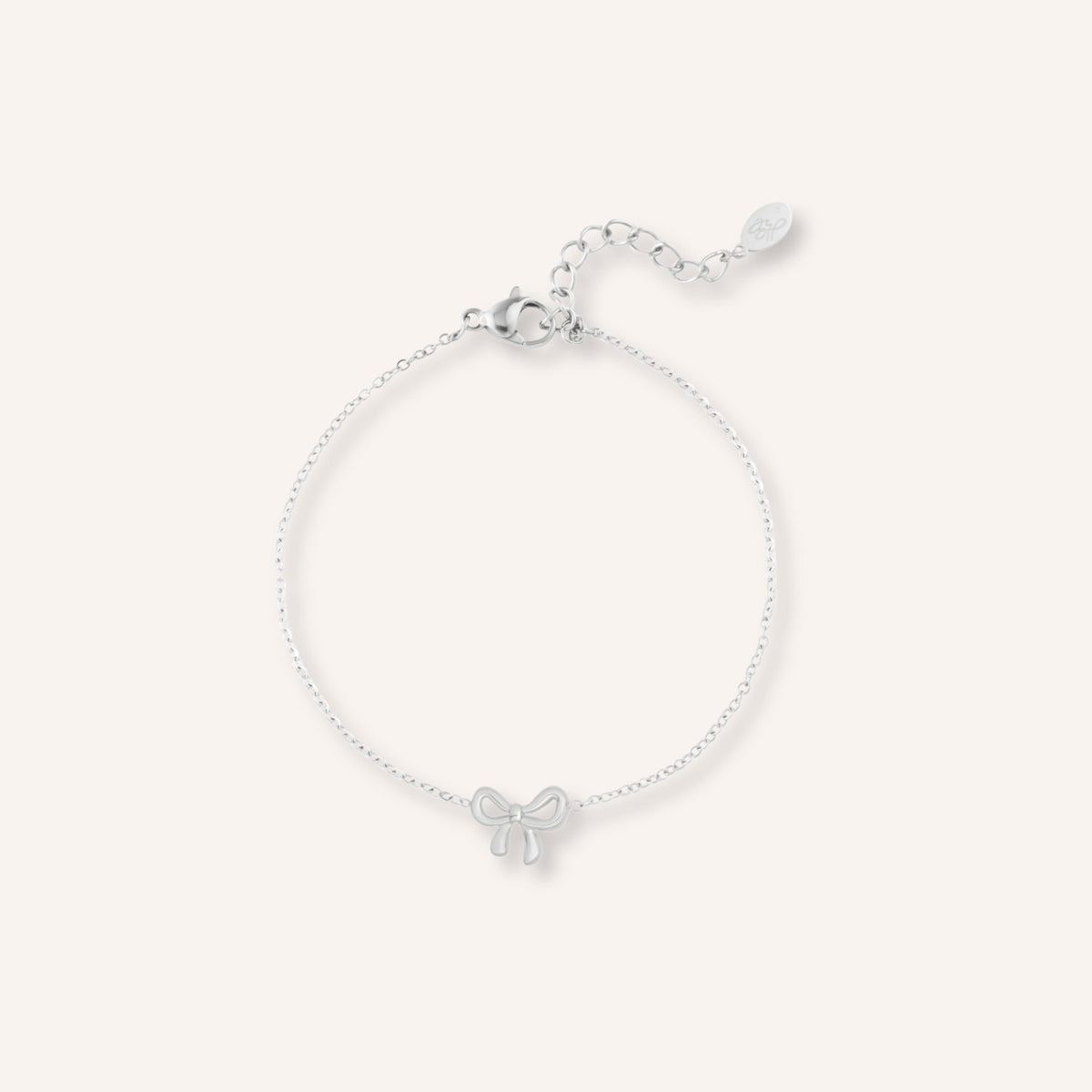 Brezza Armband in zilver, zilverkleurige armband met strikje als bedel