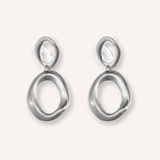 Fluida Oorbellen Zilver – zilverkleurige statement oorbellen met organische ringen