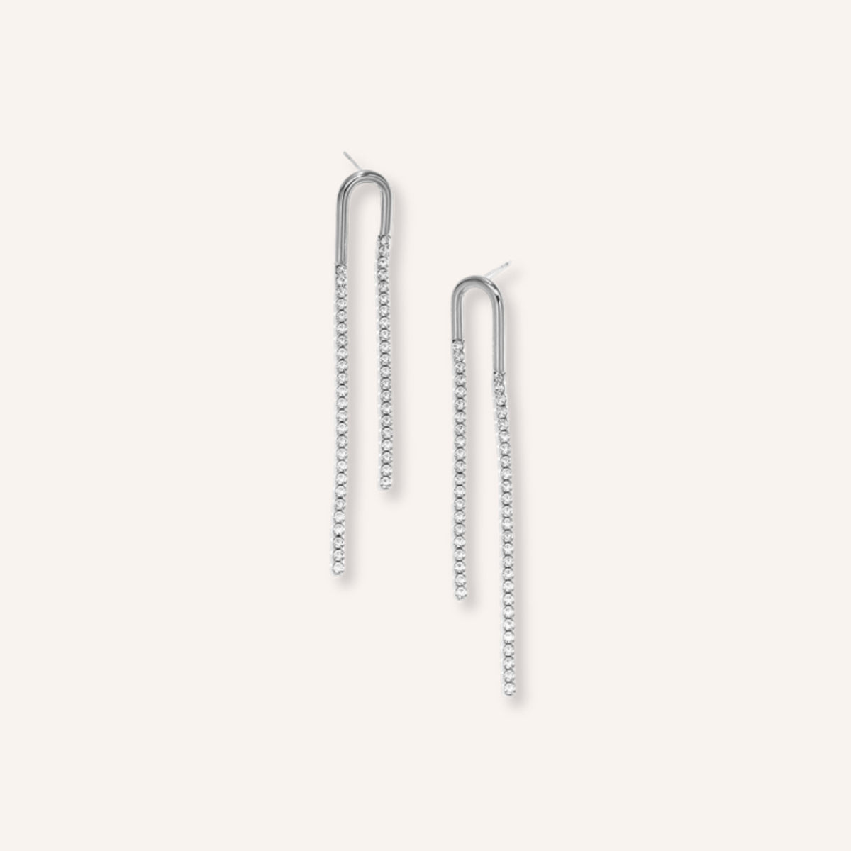 Pioggia Oorbellen in zilver, lange zilverkleurige hangers met steentjes