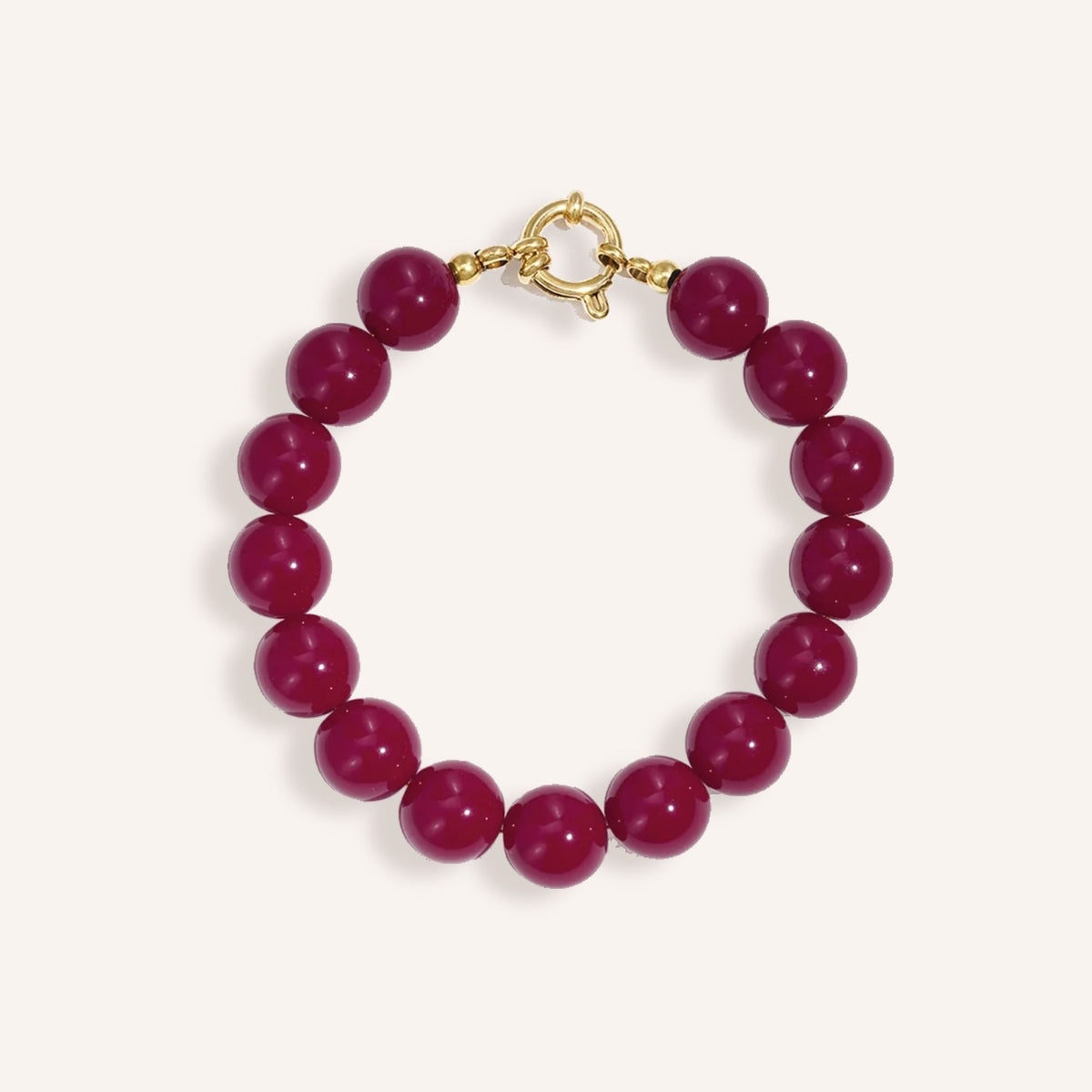 Amora Armband – Fuchsia, kralenarmband met goudkleurige ringsluiting