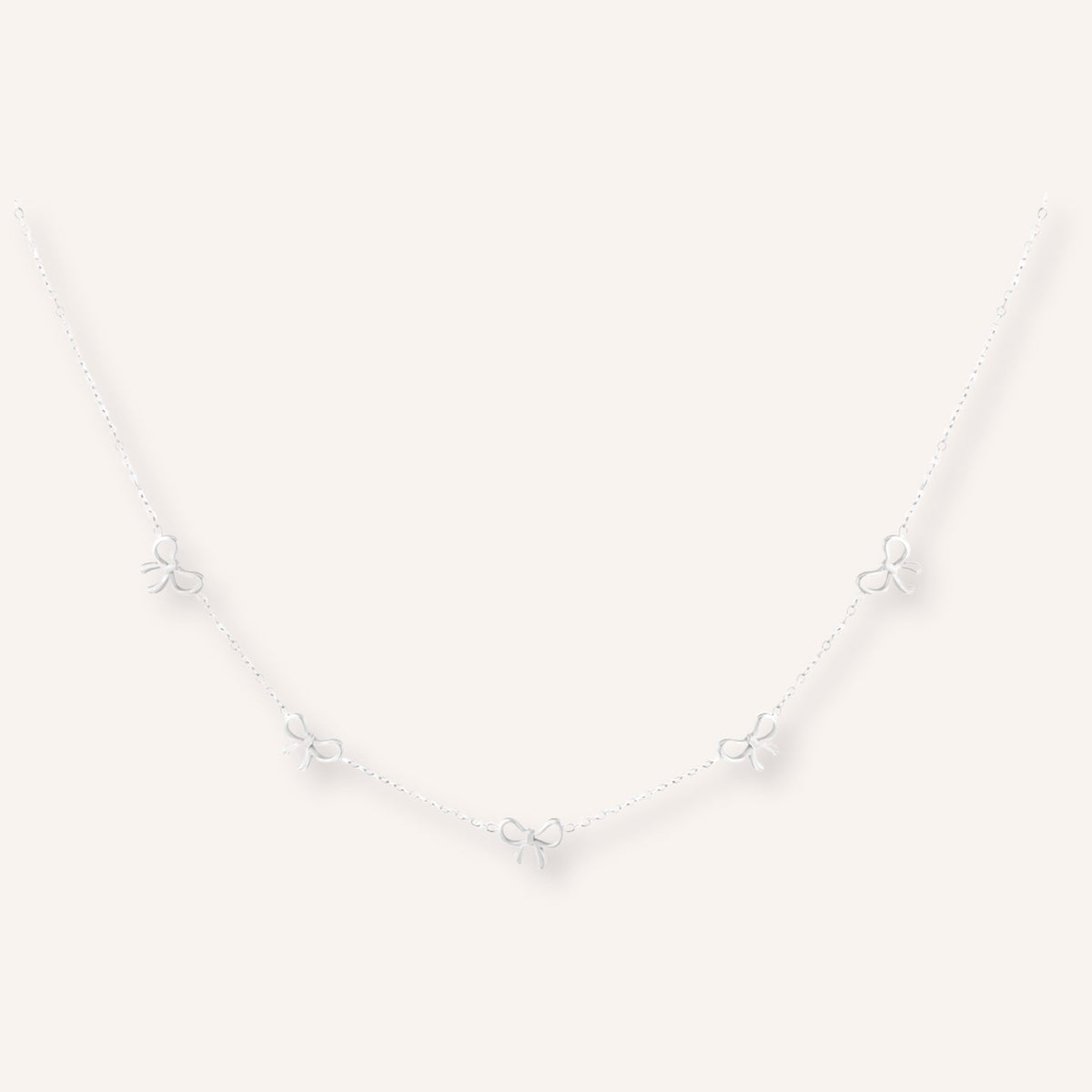 Camogli Ketting in zilver, zilverkleurige ketting met strikjes