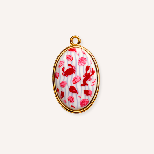 Costiera Charm, ovaal medaillon met schelpjes, krab en kreeft