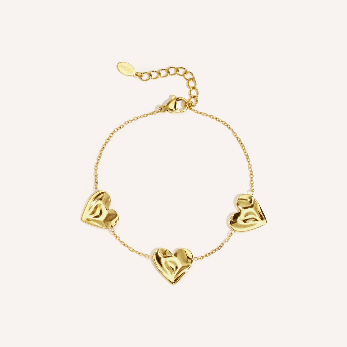 Elba Armband, goudkleurige armband met hartvormige bedel