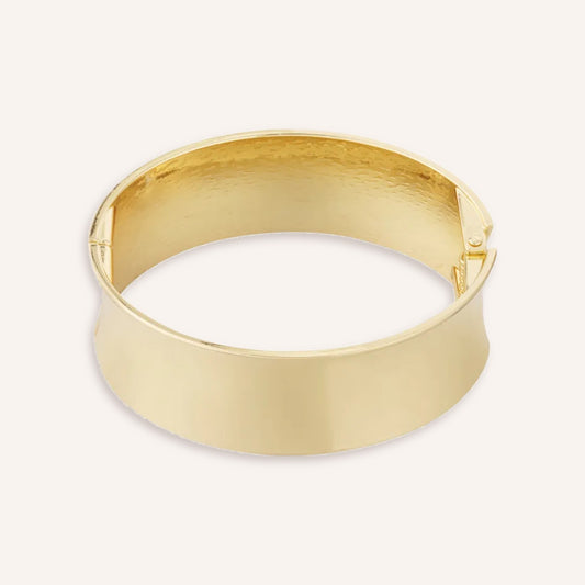Grande Armband, brede gladde goudkleurige bangle