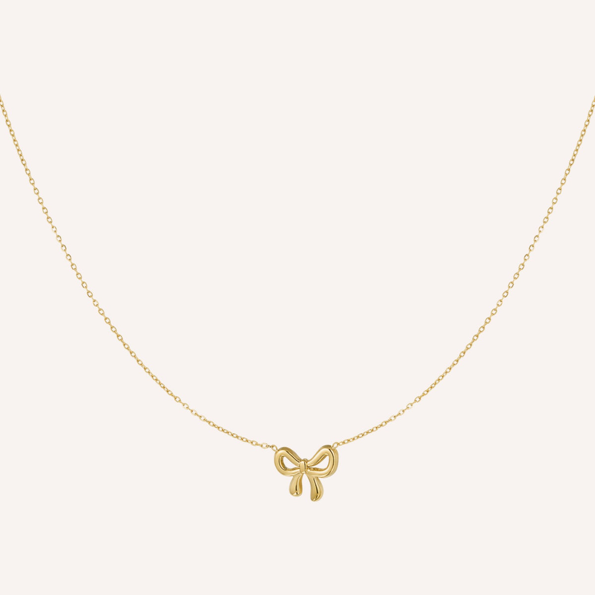 Lerici Ketting, goudkleurige ketting met strikje als hanger