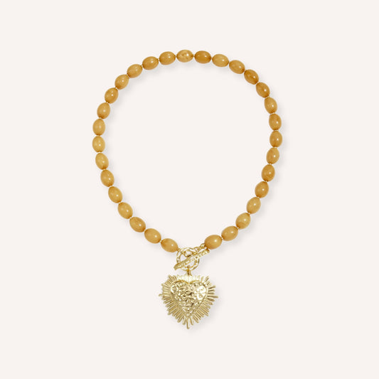 Miele Ketting, honingkleurige kralenketting met hart en stralenkrans