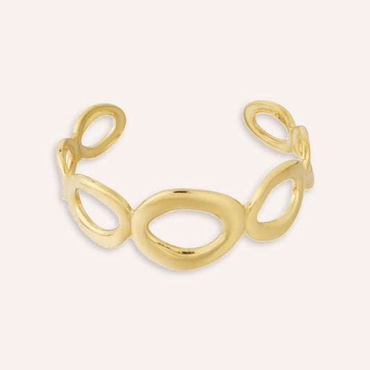 Orbita Armband, open goudkleurige cuff met ovale schakels