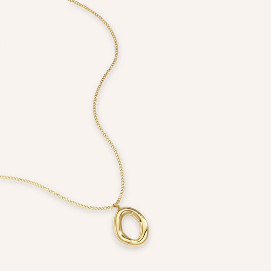 Ovalina Ketting, fijne goudkleurige ketting met organische ovale hanger