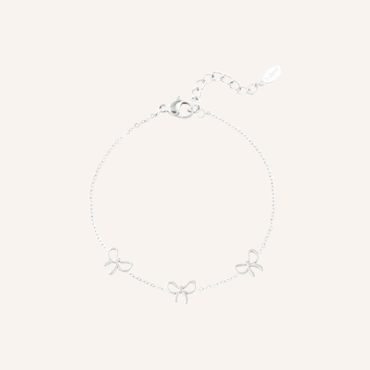 Ponza Armband in zilver, zilverkleurige bedelarmband met strikjes