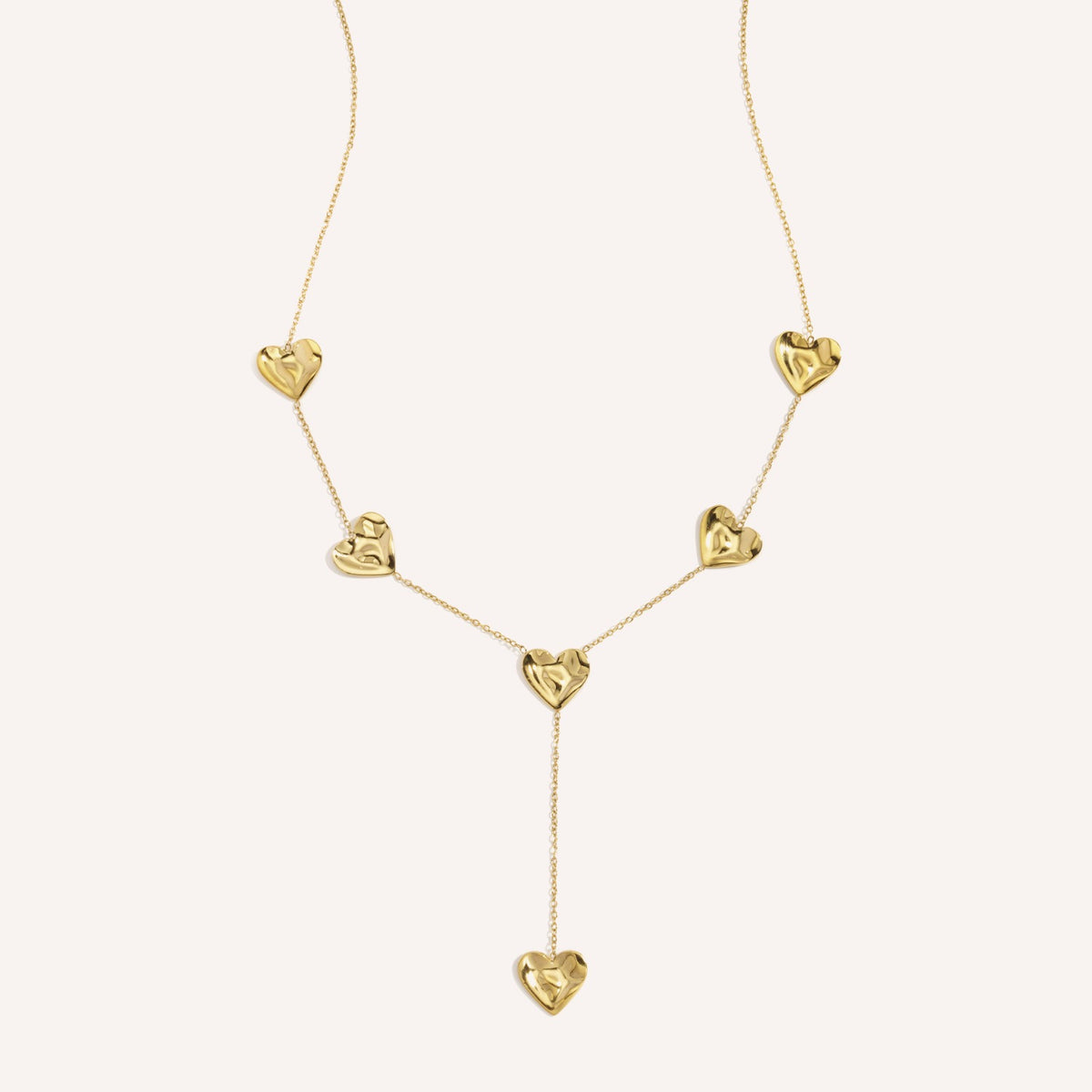 Rapallo Ketting, korte goudkleurige Y-ketting met golvende hartjes