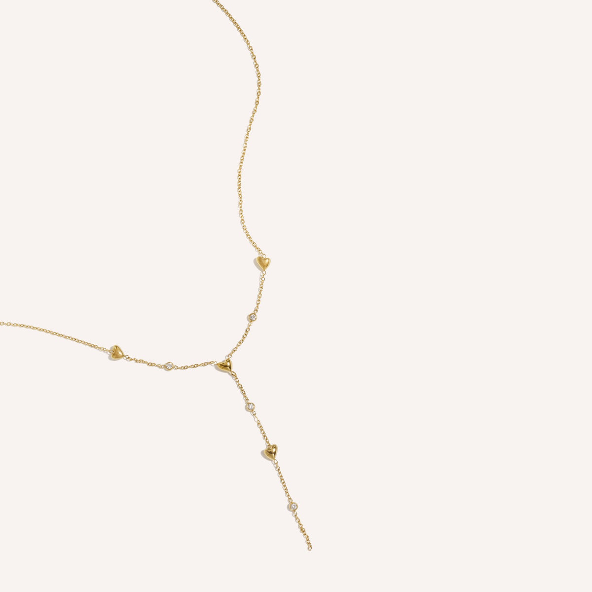 Sanremo Ketting, korte goudkleurige y-ketting met strass hartjes