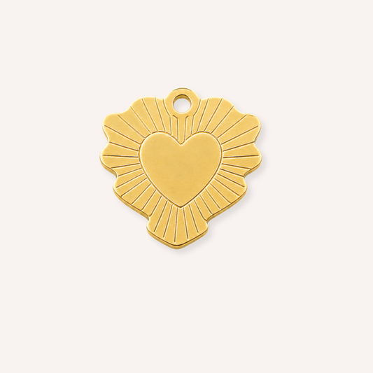 Solecuore Charm, goudkleurige bedel met hart en gekartelde zonnestralen