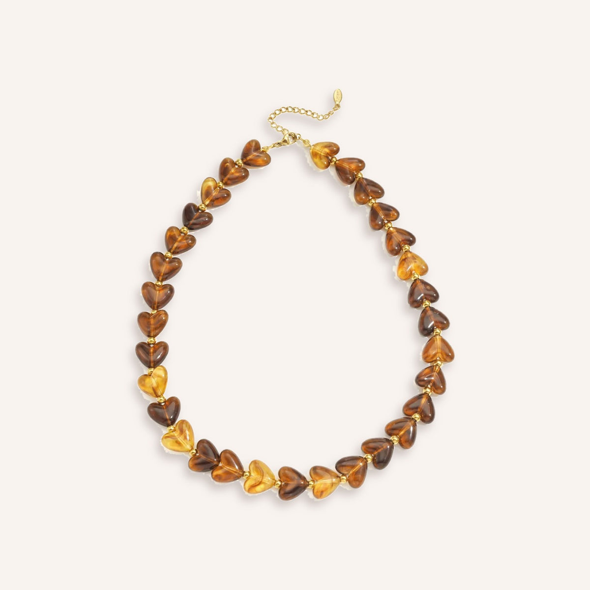 Tenerezza Ketting – Amber, ketting met acryl hartjes in ambertinten