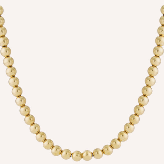 Trieste Ketting, korte goudkleurige ketting met holle bolletjes